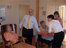 Residents make valentines day boxes.